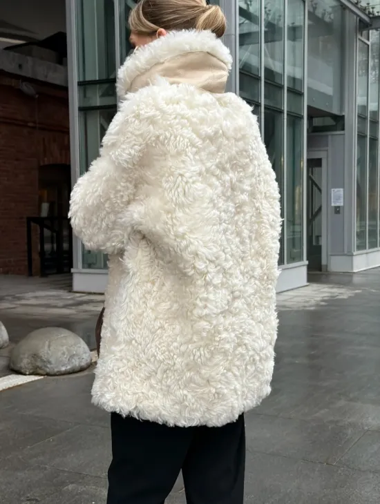 Белая шубка из тиградо - фото 9